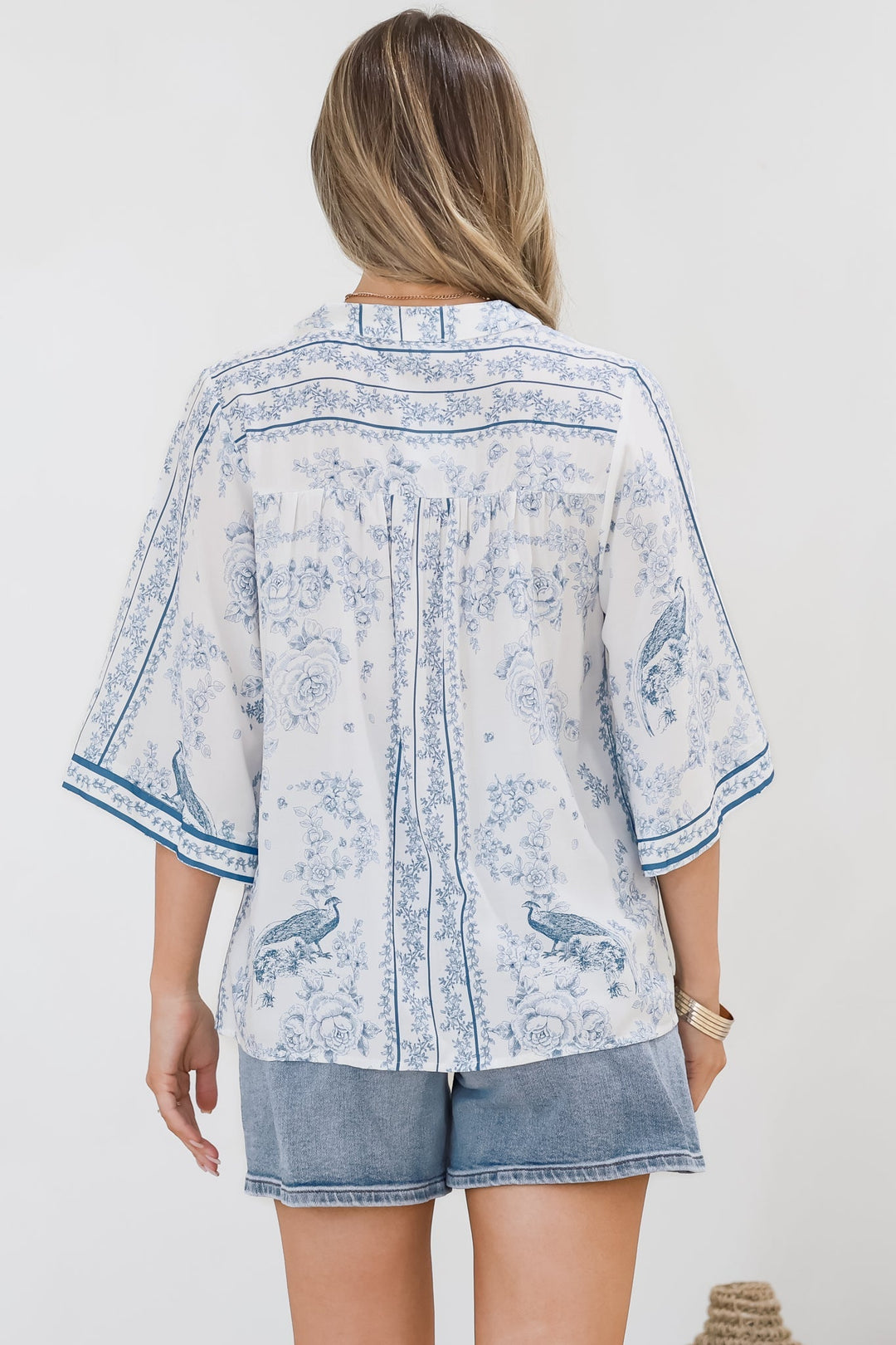 Women’s Printed V-Neck Button Front Blouse