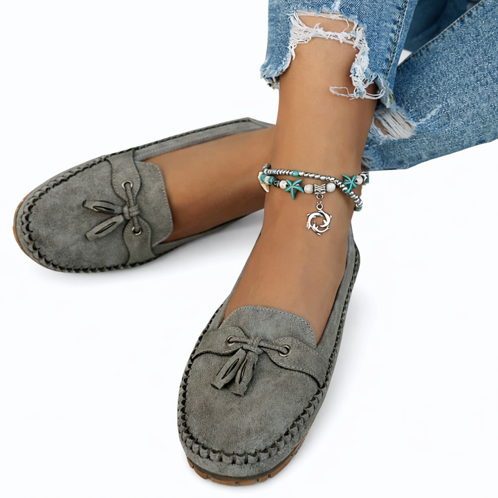 Women’s Rounded Toe Slip-On Moccasin Flats with Tassel Lace Detail